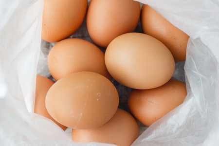 Eggs in a plastic bagの写真素材