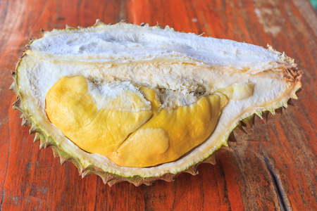 peeled durian isolated on woodの写真素材
