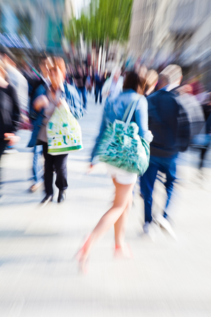 picture with creative zoom effect of shopping people in the cityの写真素材