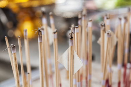 incense sticks at a Buddhist worship place in Bangkok, Thailandの写真素材