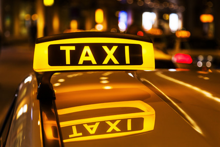 night picture of a taxi carの写真素材