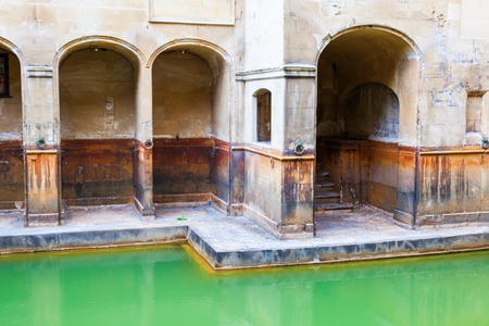 Bath, England - July 04, 2015: inside of Roman Baths with unidentified people, All All which is a site of historical interest in the city of Bath. The house is a well-preserved Roman site for public bathingのeditorial素材