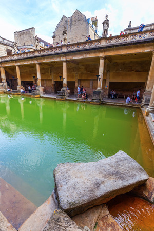 Bath, England - July 04, 2015: inside of Roman Baths with unidentified people, All All which is a site of historical interest in the city of Bath. The house is a well-preserved Roman site for public bathingのeditorial素材