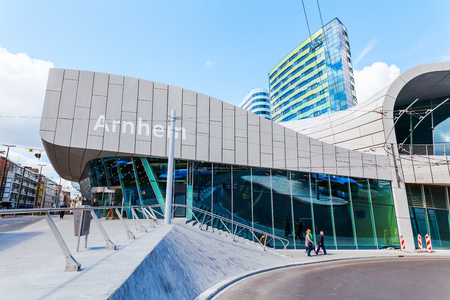 Arnhem, Netherlands - April 19, 2016: Arnhem Central railway station with unidentified people. After reconstruction it was reopened 2015.のeditorial素材