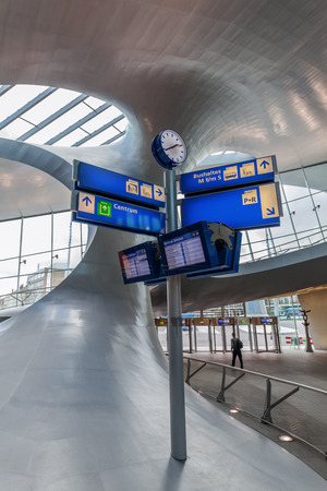Arnhem, Netherlands - April 19, 2016: Arnhem Central railway station with unidentified people. After reconstruction it was reopened 2015. The new design was by UNStudioのeditorial素材