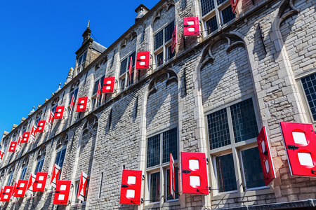 facade detail of the historical city hall on the market square in Gouda, Netherlands