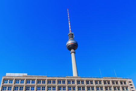 Television Tower of Berlin, Germany, behind a building of Alexanderplatzのeditorial素材
