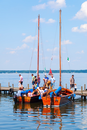 Steinhude, Germany - June 05, 2016: Steinhuder Meer at Steinhude with unidentified people. With about 30 sq km it is the largest lake of northwestern Germany and it is a nationwide tourist destinationのeditorial素材