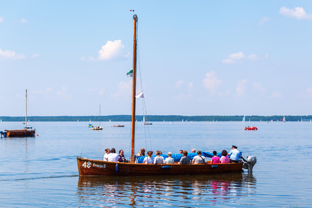Steinhude, Germany - June 05, 2016: Steinhuder Meer at Steinhude with unidentified people. With about 30 sq km it is the largest lake of northwestern Germany and it is a nationwide tourist destinationのeditorial素材