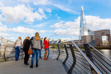 London, UK - June 15, 2016: view from London Bridge to The Shard with unidentified people. The Shard is with 310 meters the second largest building in Europe.のeditorial素材
