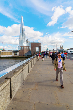 London, UK - June 15, 2016: view from London Bridge to The Shard with unidentified people. The Shard is with 310 meters the second largest building in Europe.のeditorial素材