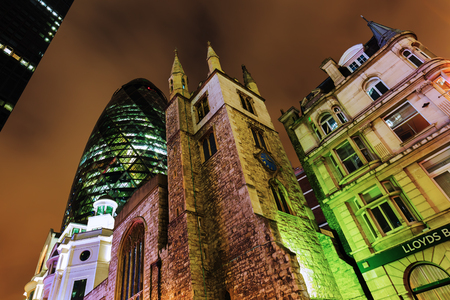 London, UK - June 17, 2016: 30 St Mary Axe at night. It is a commercial skyscraper in the City of London. It was completed in December 2003 and it is with 41 storeys 180 metres tallのeditorial素材