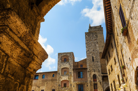 typical tower houses in the UNESCO protected medieval town center of San Gimignano, Italyのeditorial素材