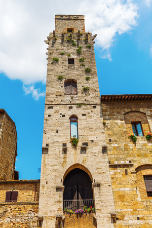 typical tower houses in the UNESCO protected medieval town center of San Gimignano, Italyのeditorial素材