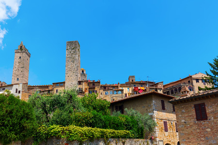 typical tower houses in the UNESCO protected medieval town center of San Gimignano, Italyのeditorial素材