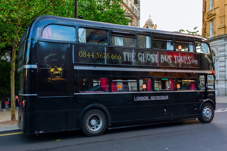 London, UK - June 20, 2016: old routemaster bus that is specially used for sightseeing tours with actors for theatrical representation in dark and scary styleのeditorial素材