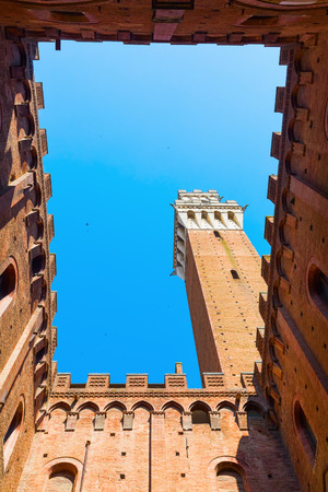 Palazzo Pubblico with Torre del Mangia in Siena, Tuscany, Italyのeditorial素材