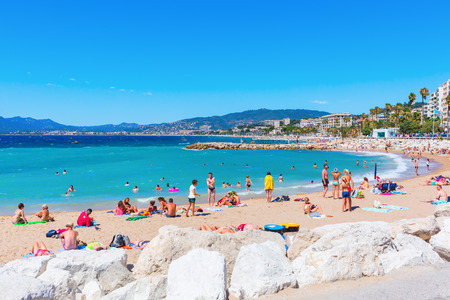 Cannes, France - August 05, 2016: city beach of Cannes with unidentified people. Cannes is a city at the French Riviera, known for its association with the rich and famous, and the Cannes Film Festivalのeditorial素材
