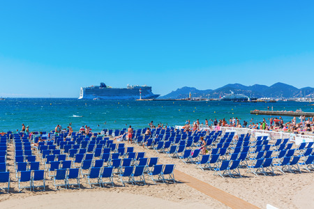 Cannes, France - August 05, 2016: city beach of Cannes with unidentified people. Cannes is a city at the French Riviera, known for its association with the rich and famous, and the Cannes Film Festivalのeditorial素材