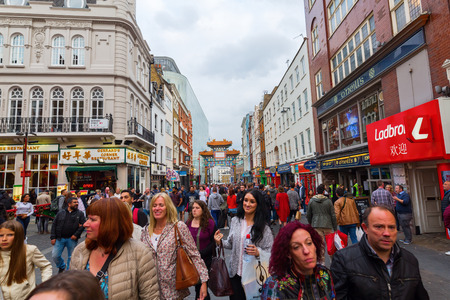 London, UK - June 18, 2016: street scene of Chinatown with unidentified people. Chinatown is part of the Soho area with a range of Chinese restaurants and other Chinese run businesses.のeditorial素材