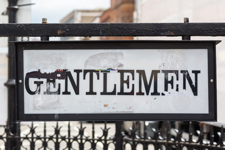 old Gentleman sign of a public toilet in London, UKの写真素材