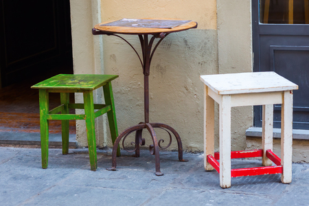 table and chairs of a small cafe in Florence, Tuscany, Italyの写真素材