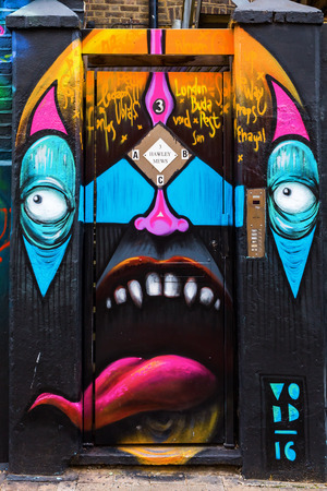 London, UK - June 15, 2016: mural art on a wall in the city of London. London has one of the biggest and best collections of uncommissioned street art in the worldのeditorial素材