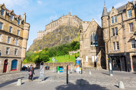 Edinburgh, Scotland - September 11, 2016: Grassmarket in Edinburgh with unidentified people with view to the castle. The Grassmarket is a historic market place and an events space in the old townのeditorial素材