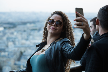 Paris, France - October 16, 2016: unidentified people on the Eiffel Tower in Paris. The Eiffel Tower is the most-visited paid monument in the world, 6.91 million people ascended it in 2015.のeditorial素材
