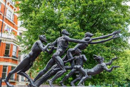 London, UK - June 21, 2016: Pan Statue, also known as Rush of Green, in London. The statue was designed by Sir Jacob Epstein in 1961 and is located by Edinburgh Gate on south side of Hyde Parkのeditorial素材