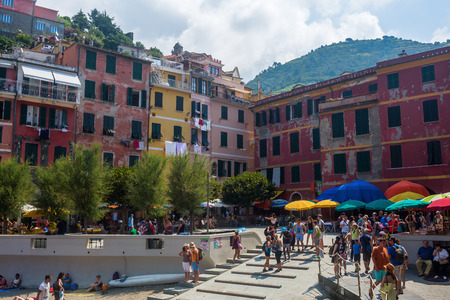 Vernazza, Italy - July 02, 2016: harbor of Vernazza, Cinque Terre, with unidentified people. Vernazza is one of the famous five UNESCO protected picturesque towns in the Cinque Terre.のeditorial素材