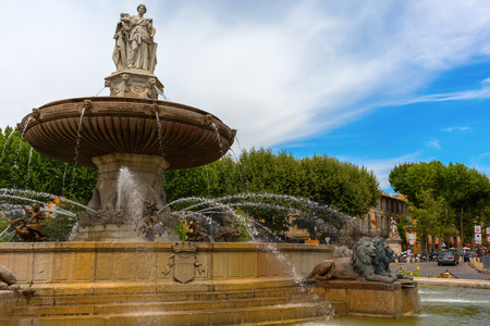 Aix-en-Provence - July 27, 2016: fountain on the Place de la Rontonde in Aix-en-Provence with unidentified people. Aix-en-Provence is University city and the historical capital of the Provence.のeditorial素材