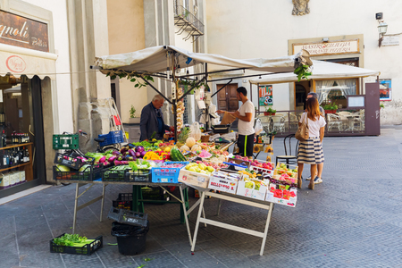 Florence, Italy - July 04, 2016: market stall in the old town of Florence with unidentified people. In medieval time Florence was the center of European trade and one of the wealthiest citiesのeditorial素材