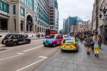 London, UK - June 18, 2016: street view at Bishopsgate in the City of London with unidentified people. The City of London is a county in London. There is the major business and financial centre.のeditorial素材
