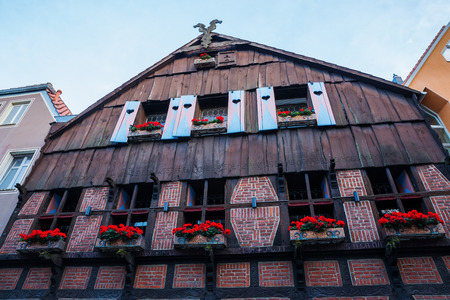 Muenster, Germany - September 25, 2016: gable of a historical house in the old town of Muenster. Muenster is well known as bicycle city and for the after WW I partly restored historical old townのeditorial素材