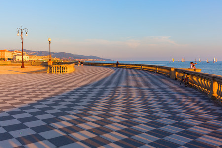 Livorno, Italy - July 01, 2016: Terrazza Mascagni with unidentified people. Its a wide sinuous belvedere toward the sea with a paving surface of 8700 sqm like a checkerboard and 4,100 balustersのeditorial素材