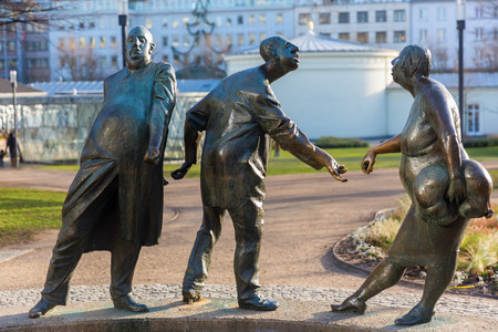 Aachen, Germany - December 27, 2016: bronze statue named circulation of money in Aachen, with unidentified people. Aachen is a spa town in NRW and was residence of Charlemagneのeditorial素材