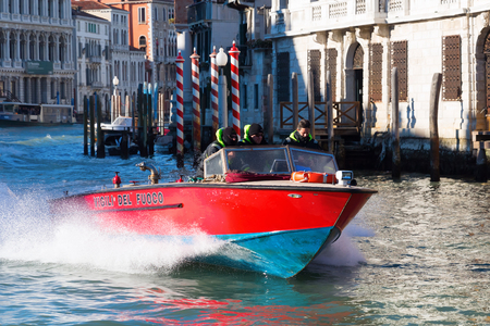 Venice, Italy - February 25, 2017: fire department boat in Venice with unidentified people.のeditorial素材