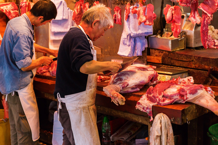 Hong Kong, Hong Kong - March 09, 2017: at a butchery in Kowloon, Hong Kong, with unidentified people. Hong Kong is one of worlds most significant financial centres, 4th most densely populated stateのeditorial素材