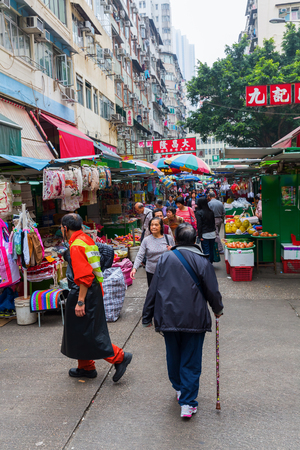 Hong Kong, Hong Kong - March 03, 2017: market street in Kowloon, Hong Kong, with unidentified people. Hong Kong is one of worlds most significant financial centres, 4th most densely populated stateのeditorial素材