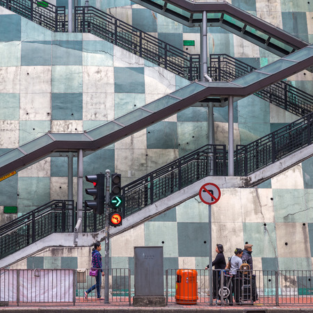 Hong Kong, Hong Kong - March 09, 2017: street scene in Kowloon, Hong Kong, with unidentified people. Hong Kong is one of worlds most significant financial centres, 4th most densely populated stateのeditorial素材