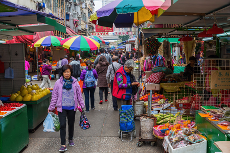 Hong Kong, Hong Kong - March 10, 2017: market street in Kowloon, Hong Kong, with unidentified people. Hong Kong is one of worlds most significant financial centres, 4th most densely populated stateのeditorial素材