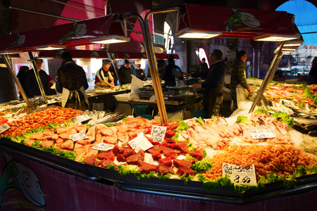 Venice, Italy - February 25, 2017: market scene at the Rialto Street Market in Venice with unidentified people. Venice is world renown for the beauty of its settings, a part is UNESCO listedのeditorial素材