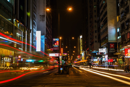 Hong Kong, Hong Kong - March 14, 2017: street scene at night in Kowloon, with unidentified people. HK is one of worlds most significant financial centres and the 4th most densely populated stateのeditorial素材
