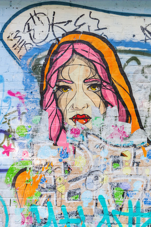 London, UK - June 18, 2016: street art in London. Street art has moved from the beginnings of graffiti and vandalism to new modes where artists work to bring messages or the beauty, to an audienceのeditorial素材