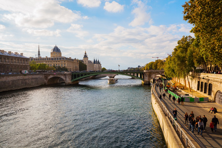 Paris, France - October 15, 2016: view over the Seine with and unidentified people. Paris is the capital of France and one of Europes major centres of finance, commerce, fashion, science, and the artsのeditorial素材
