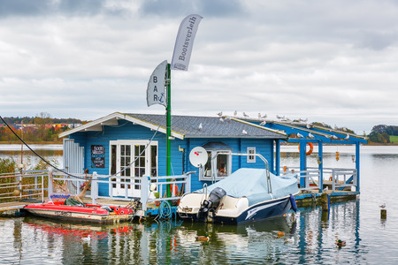 Wolgast, Germany - October 23, 2017: view at the city harbor of Wolgast. Wolgast is situated at the Baltic Sea coast, called the Gate to Usedom, with well preserved historic buildings in old townのeditorial素材