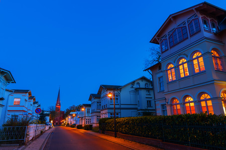 Ahlbeck, Germany - October 22, 2017: Street in Ahlbeck at night. Ahlbeck is a Baltic Sea resort that has numerous scenic houses and mansions in the German style of resort architectureのeditorial素材