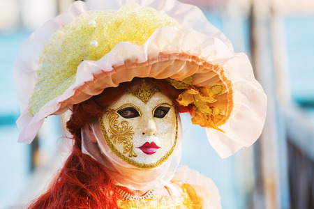 Venice, Italy - February 26, 2017: unidentified disguised women at the Carnival of Venice. The Carnival of Venice is an annual festival, world famous for its elaborate masks.のeditorial素材