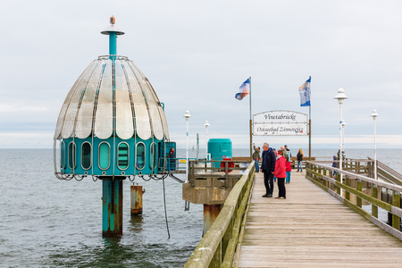 Zinnowitz, Germany - October 24, 2017: diving gondola at the Zinnowitz Pier with unidentified people. It is a main tourist attraction, installed 2006 it was the first one in Germanyのeditorial素材